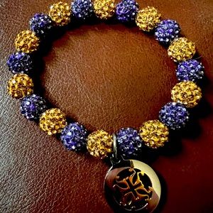Rustic Cuff Emerson Lavender & Gold beaded bracelet w/silver & gold RC logo.